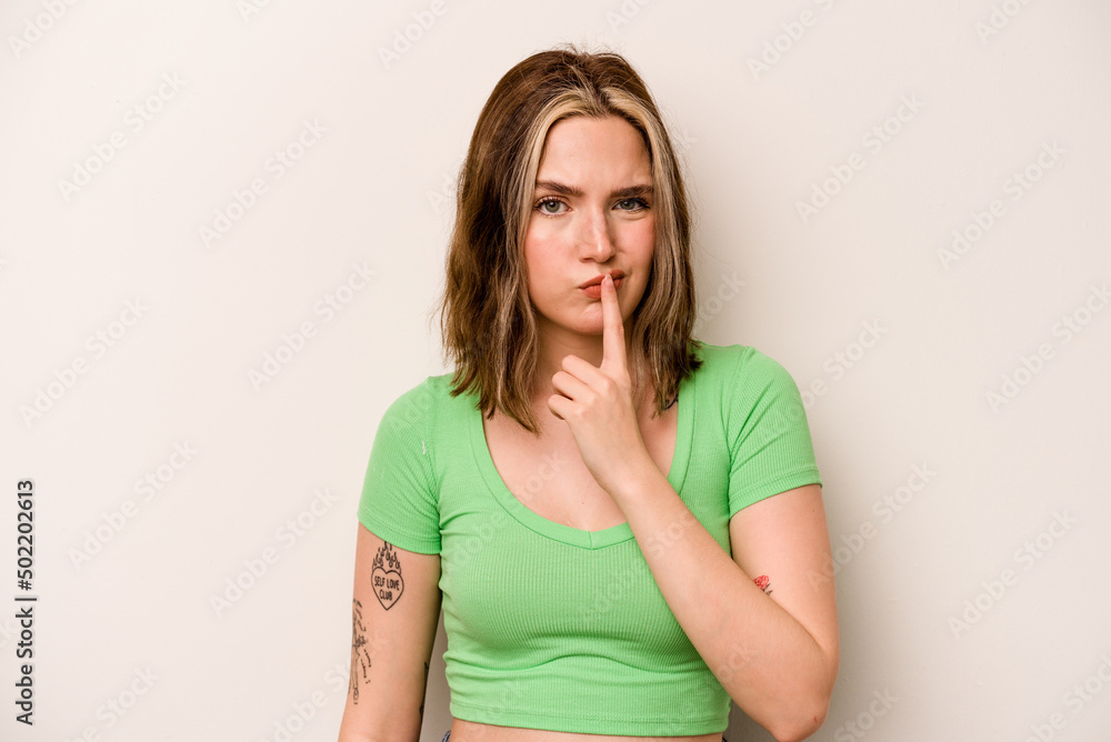 Young caucasian woman isolated on white background thinking and looking up, being reflective, contemplating, having a fantasy. Young caucasian woman isolated on white background thinking and looking up, being reflective, contemplating, having a fantasy.