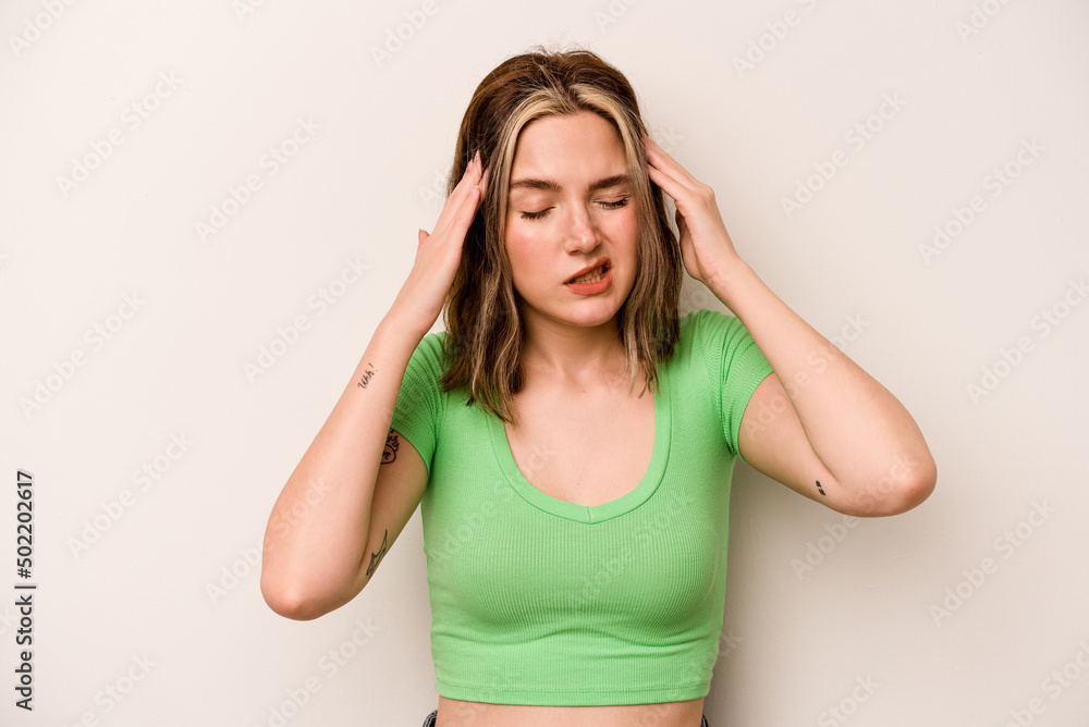 Young caucasian woman isolated on white background touching temples and having headache. Young caucasian woman isolated on white background touching temples and having headache.