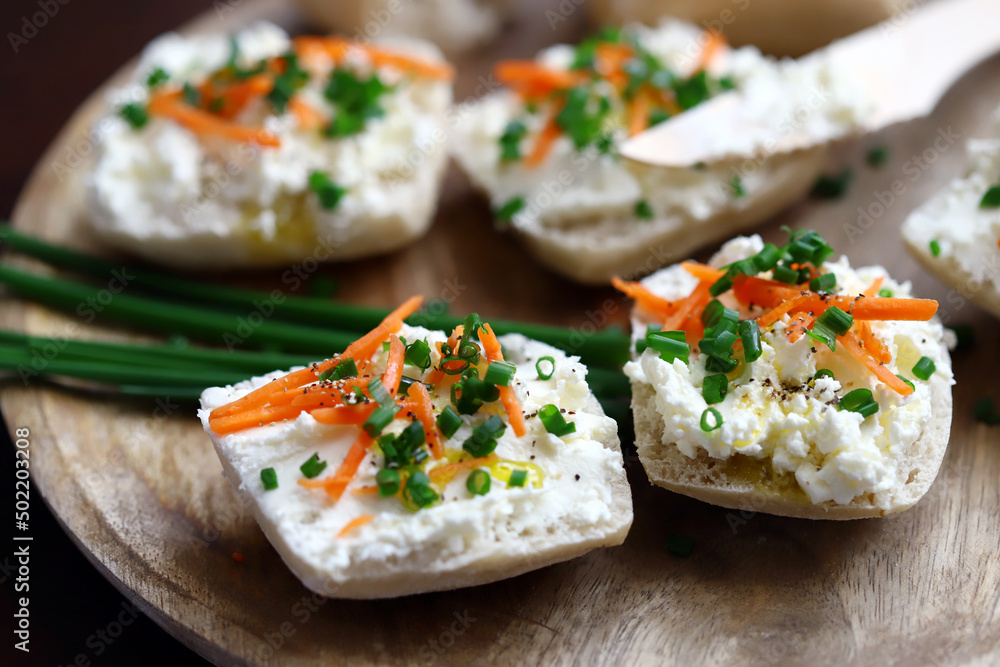 Canape with cream cheese and green onions. Healthy sandwich. Canape with cream cheese and green onions. Healthy sandwich.
