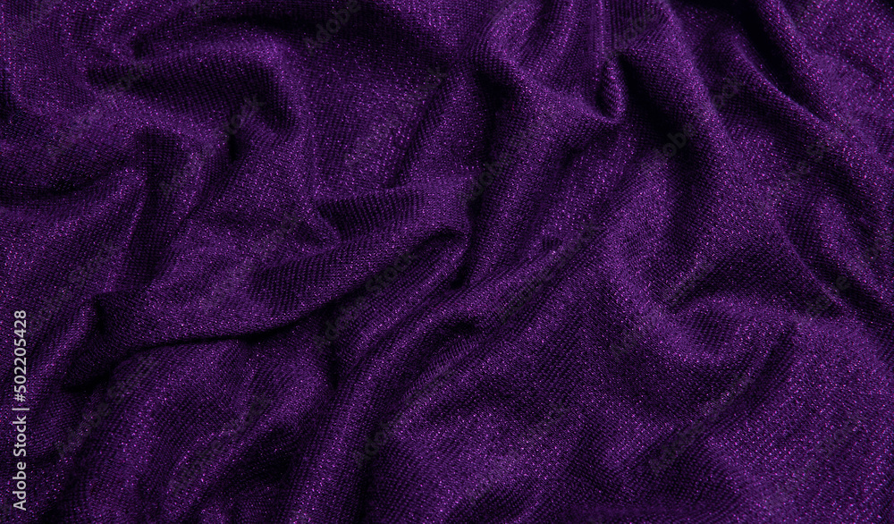 Smooth shiny fabric texture with folds and wawes. Close up silk background Smooth shiny fabric texture with folds and wawes. Close up silk background