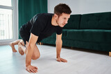 Man doing sport exercises at home, Sport training at home, Helathy lifestyle concept
