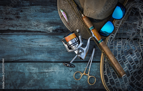 Canvas Print Fishing tackle background. Trout stream fishing.