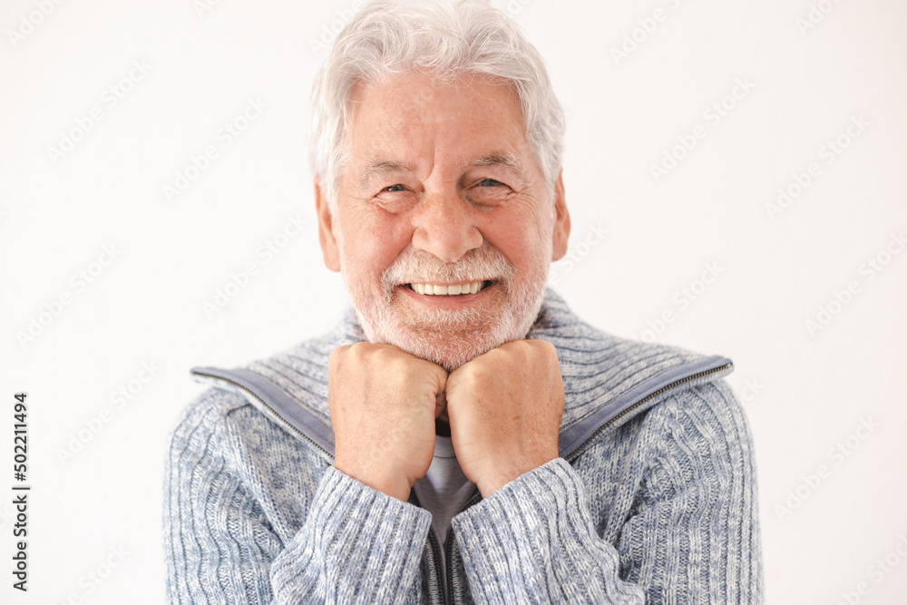 Portrait of smiling senior caucasian man relaxed over isolated white background looking at camera Portrait of smiling senior caucasian man relaxed over isolated white background looking at camera