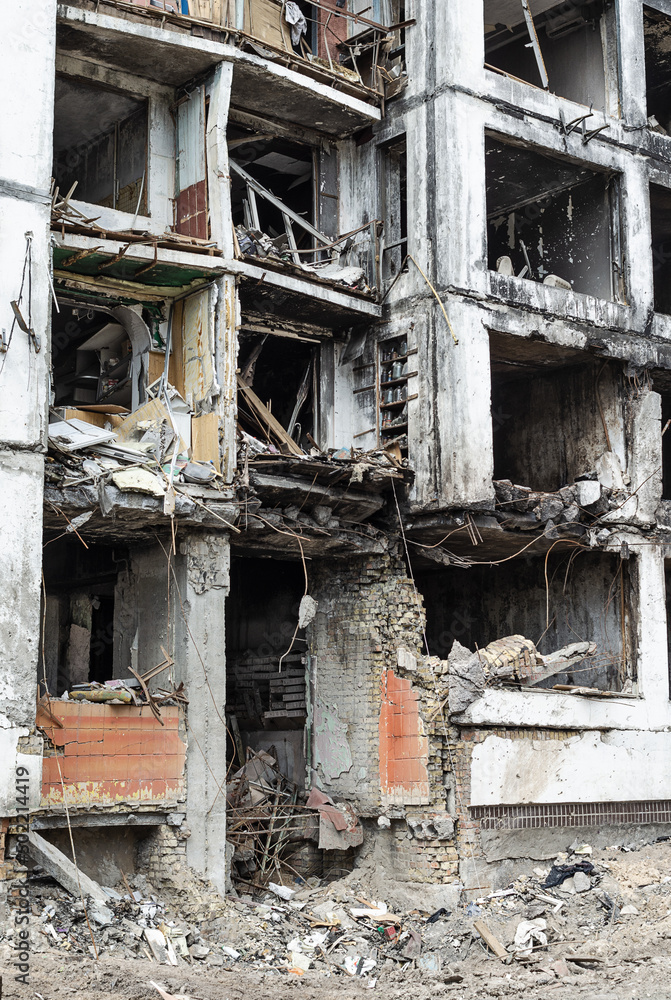 Destroyed residential building after shelling Destroyed residential building after shelling