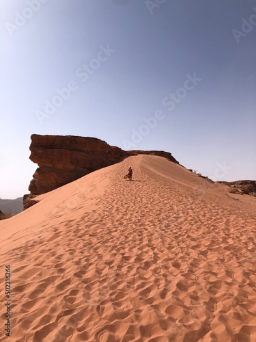 Girl on the dunes of the wadi rum s desert