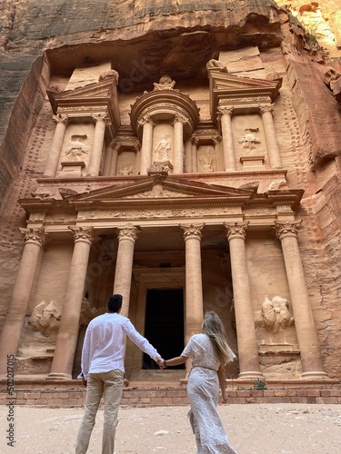 couple in front of the Petra's Treasury photo