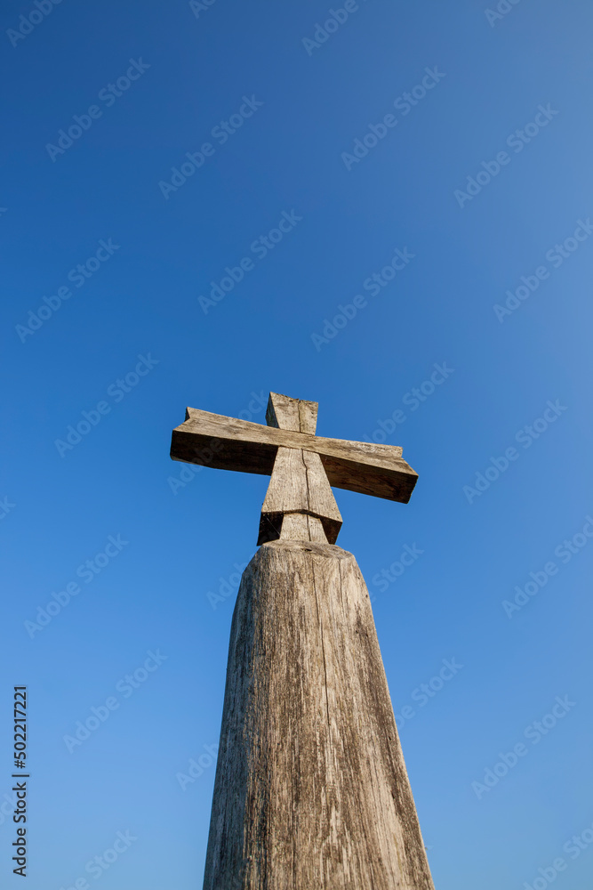 religious catholic cross made of wood in nature