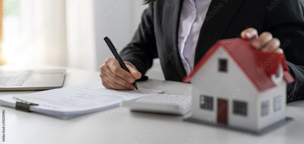 Fototapeta premium agents working in real estate investment and home insurance signing contracts in accordance with the home buying insurance agreements approving purchases for clients