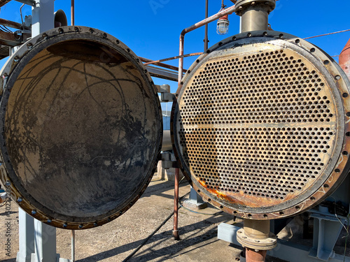 Shell-and-tube (shell-and-tube) heat exchanger for heat exchange between two streams close-up. Heat exchanger tubes in the open photo