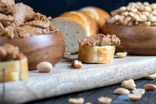 nut food on a cutting wooden board in the kitchen