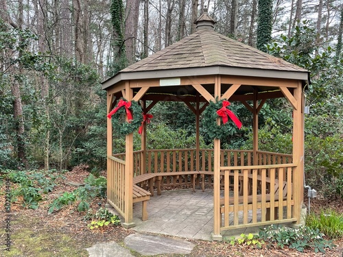 Wooden gazebo and holiday decor photo