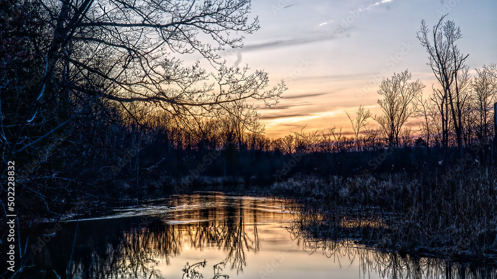 Spring Sunset over the Huron River, Proud Lake Recreation Area, Oakland County, Michigan Spring Sunset over the Huron River, Proud Lake Recreation Area, Oakland County, Michigan