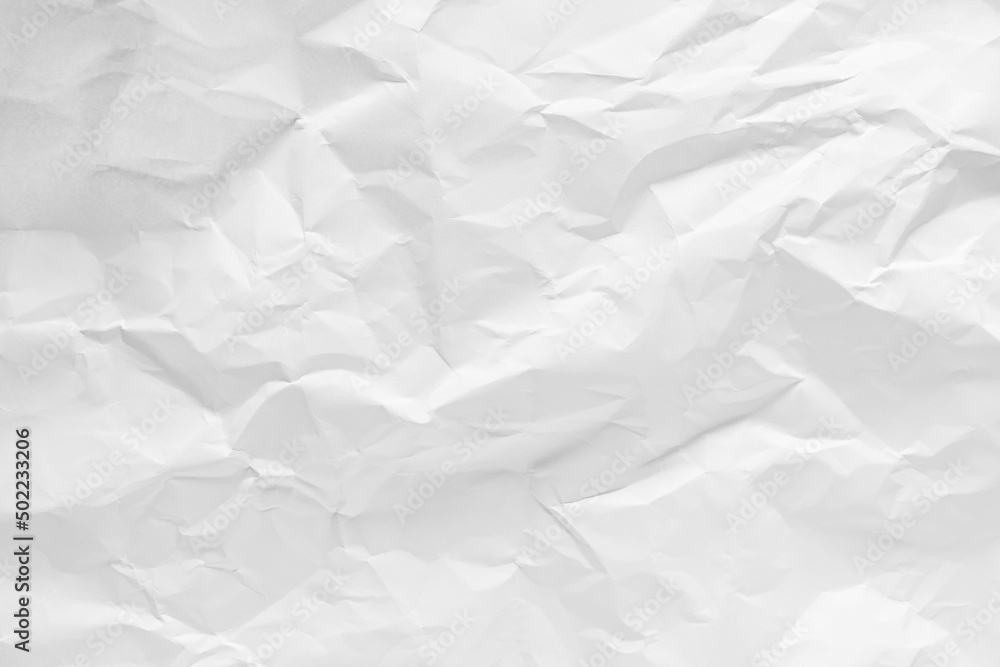 Fototapeta premium White crumpled paper texture background.