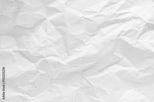 White crumpled paper texture background.