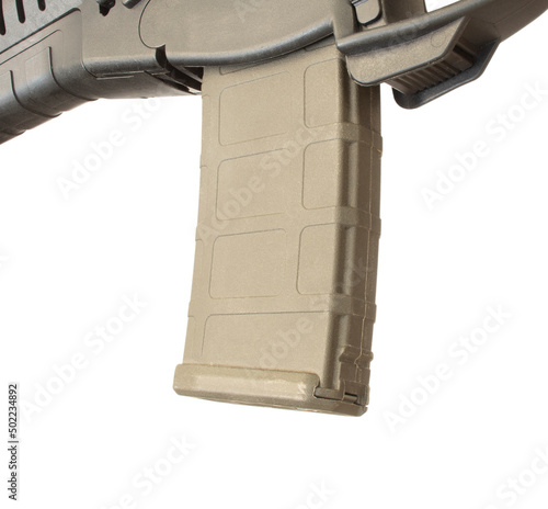 High capacity tan magazine in a rifle