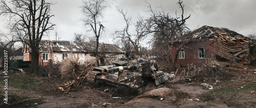Fotografie War in Ukraine. Destroyed Ukrainian tank in Chernihiv region