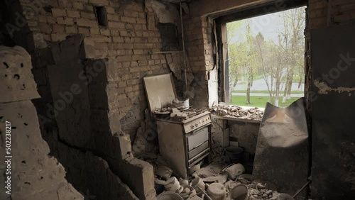 The ruins of an apartment in a destroyed residential building as a result of a bombing by the Russian army in Ukraine photo