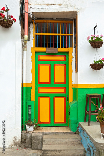 Beautiful doors and facades of the houses Salento city in Colombia