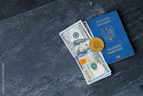 foreign passports and bitcoin coin ukraine and cryptocurrency concept dollars