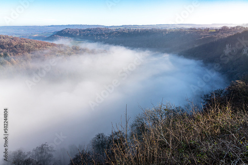 The River Wye totally obscured by mist due to a temperature inversion  seen from the viewpoint of Symonds Yat Rock  Herefordshire  England UK