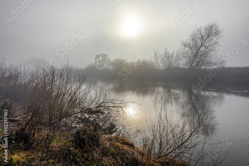 Gloomy light on a misty day on the River Wye at Huntsham Bridge, Herefordshire, England UK