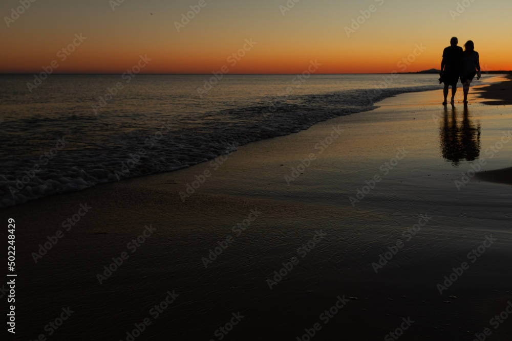 Long shot of a sunset beach