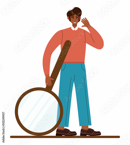 Indian businessman holding a magnifying glass. Character wearing business casual photo