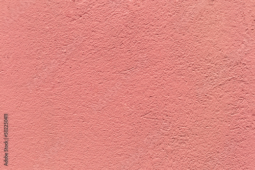 Pink concrete wall pastel background. acrylic-based coating. Purple textured modern interior wall finish. Exterior wall vintage light pink texture stucco paint.