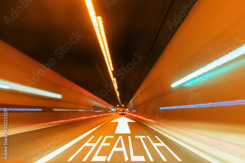 Health text on the road in the tunnel. Goals for new year concept. Road to recovery. 