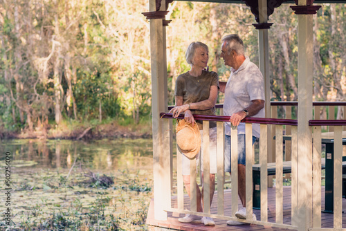 senior couple on nature walk photo