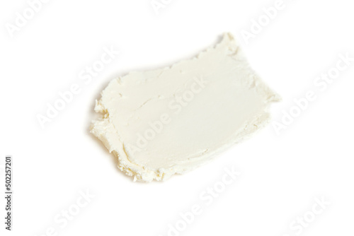 A smear of whipped mascarpone cream cheese isolated on white background photo