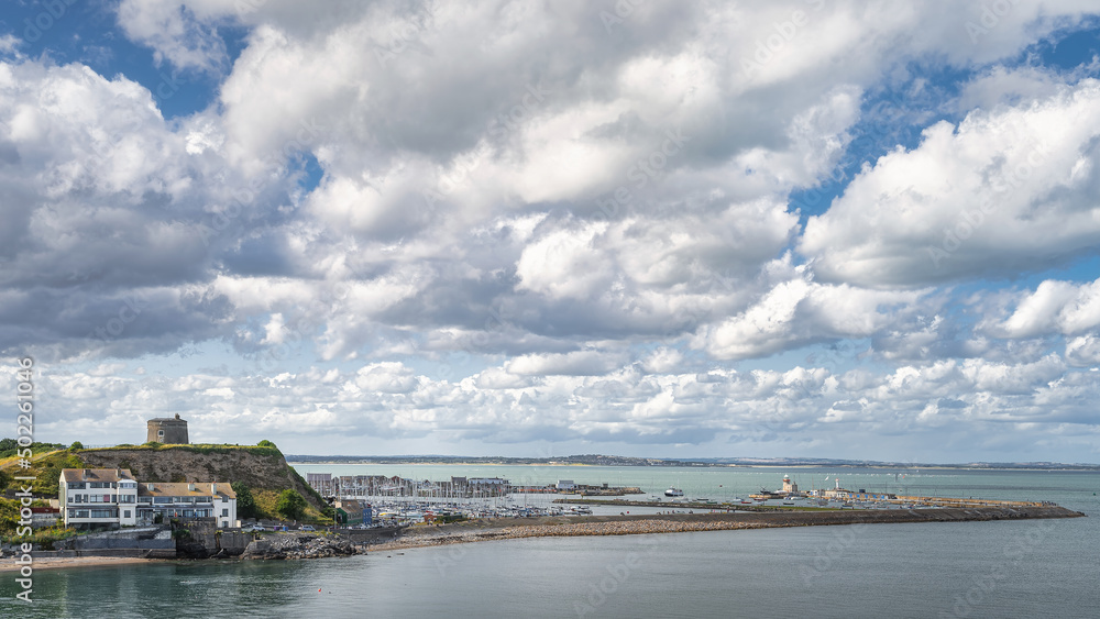Howth marina and Martello Tower seen from Howth cliff walk, popular tourist attraction, Dublin, Ireland