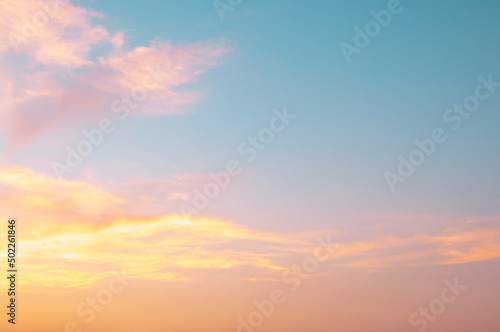 Orange sunset sky. Beautiful natural of sky abstract or background. Soft focus image. © nongnuch_l
