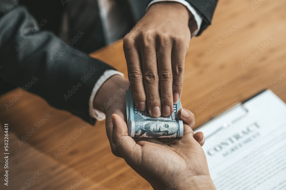 Two people are doing corrupt behavior, they are mutual business