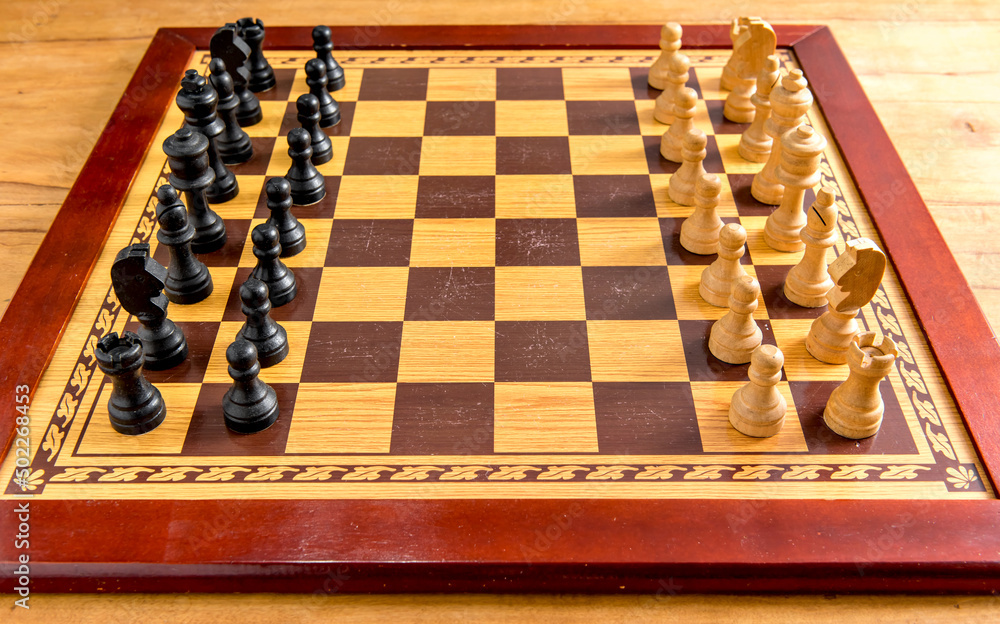 Chess battle on a wooden board, chess game. Chess battle on a wooden board, chess game.