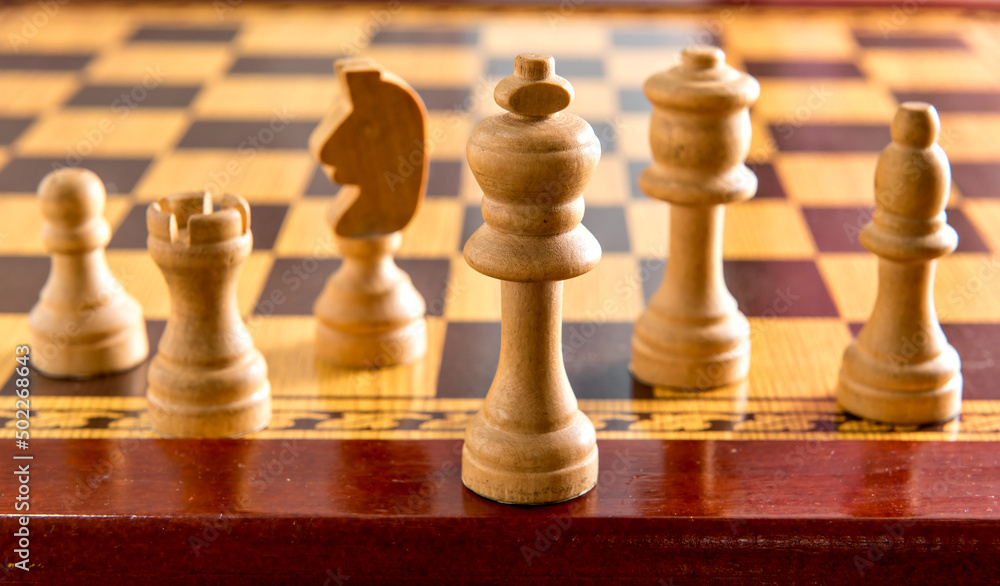Chess game, board and wooden pieces. Chess game, board and wooden pieces.