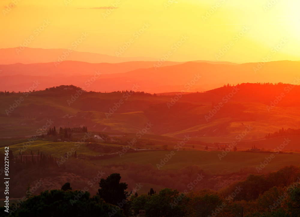 Crete Senesi rural landscape. Green fields of Tuscany near Siena, Italy, Europe