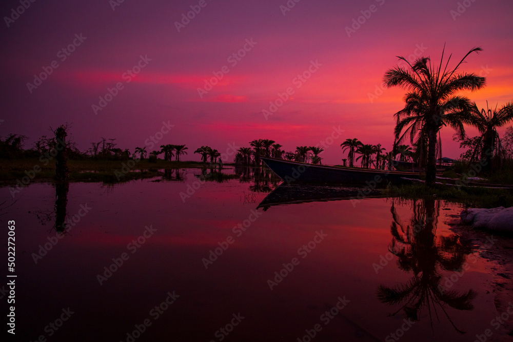 Fototapeta premium sunset over the river