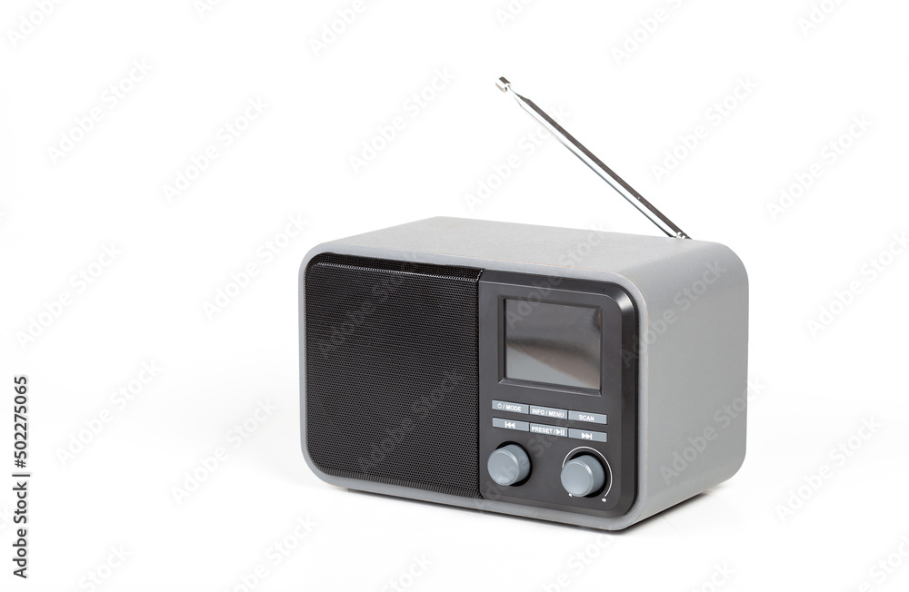 Simple small generic digital and analog home radio receiver device, object  isolated on white, cut out. AM FM bands modern radio product, DAB, DAB+,  internet radio receiver technology broadcast concept Stock-Foto