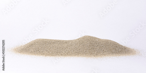 sunny pile of sand on white background