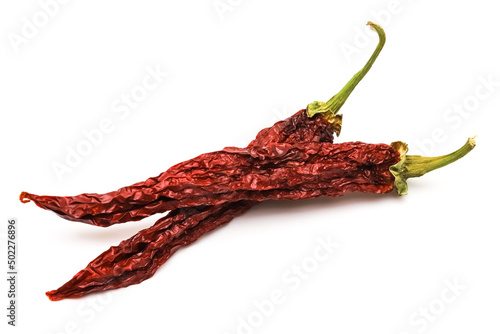 Dried red pepper on a white background. Close-up photo