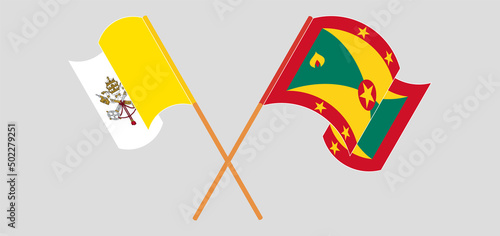 Crossed and waving flags of Vatican and Grenada