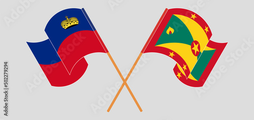Crossed and waving flags of Liechtenstein and Grenada