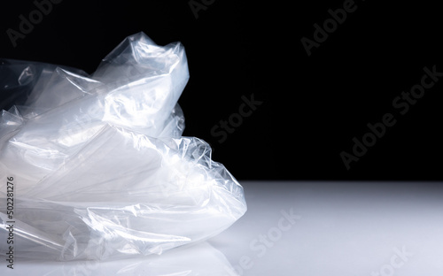 Transparent plastic bag on a dark background.