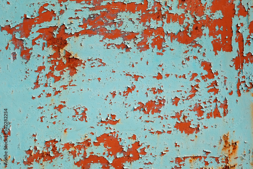 Metal sheet rusty faded texture. Peeling turquoise paint on a concrete wall. Steel plate background. Metal sheet rusty faded texture. Peeling turquoise paint on a concrete wall. Steel plate background.