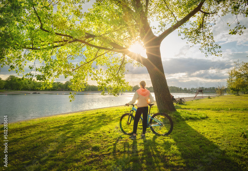 Woman riding a mountain bik...