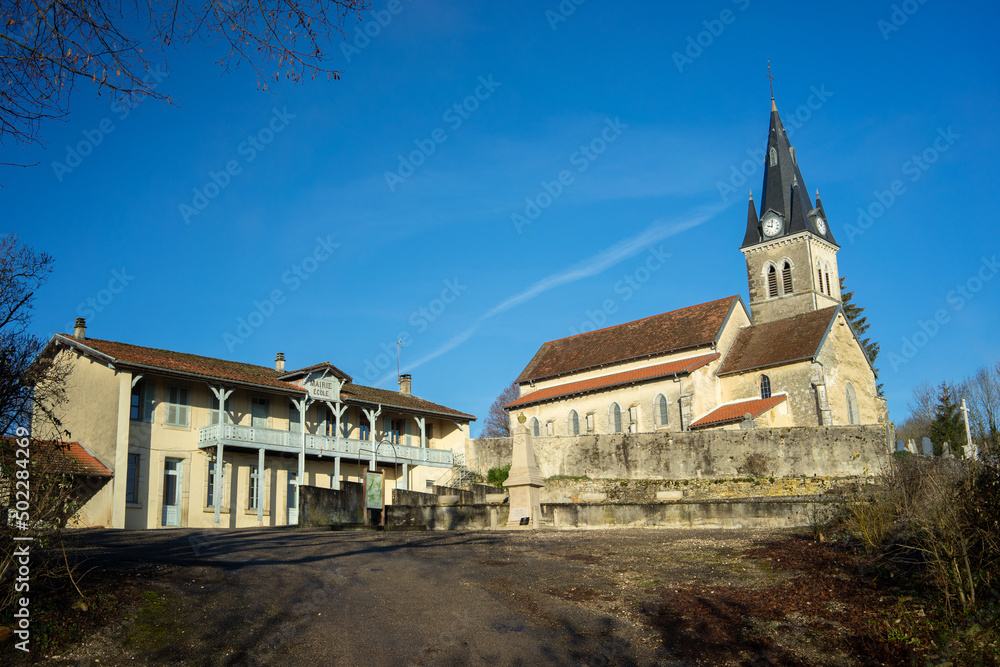 Obraz premium The Saint Didier church and the old town hall and school (mairie, école) of Rignat, Ain, France.