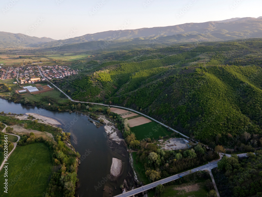 Naklejka premium Aerial Sunset view of Struma river passing, Bulgaria