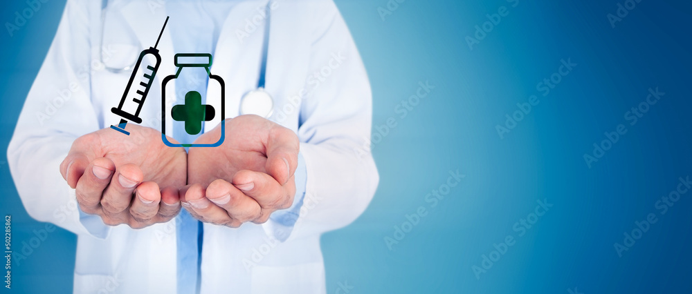 Doctor holding a vaccine and syringe icon in his hand Doctor holding a vaccine and syringe icon in his hand