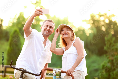 Mature couple with bicycles...